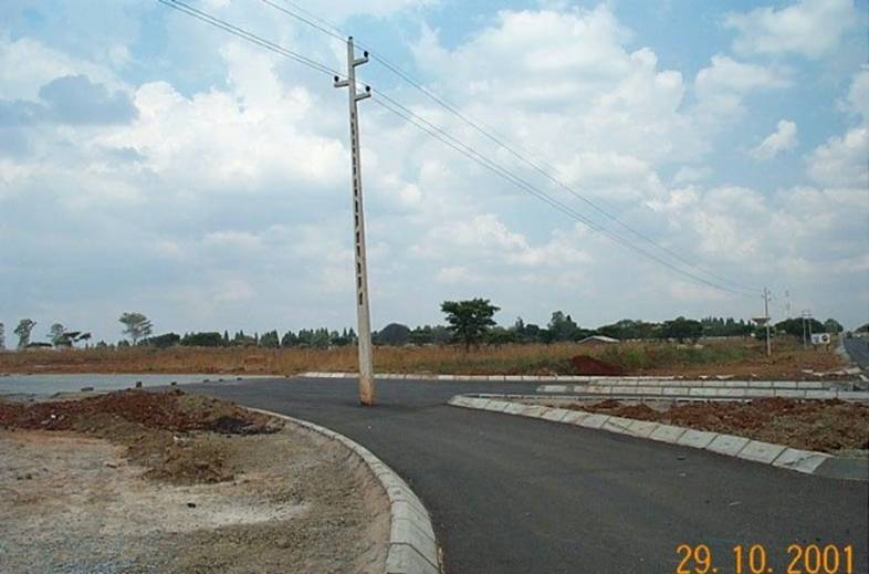 Electric Post in the middle of the road